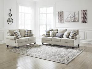 Wide range of Ashley Casual Sofa available at a low price. Buy Meggett Sofa Made of Exposed feet with faux wood finish in Linen color up to 40% Off.